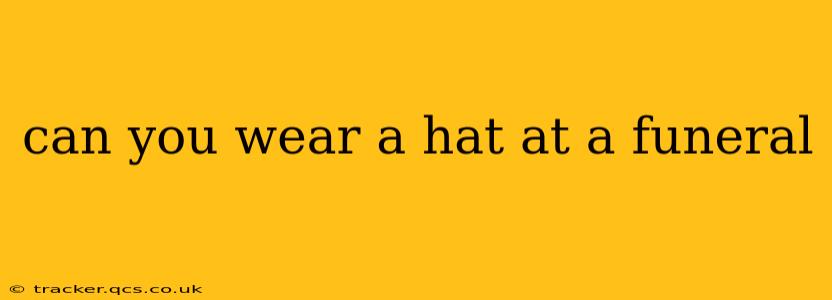 can you wear a hat at a funeral