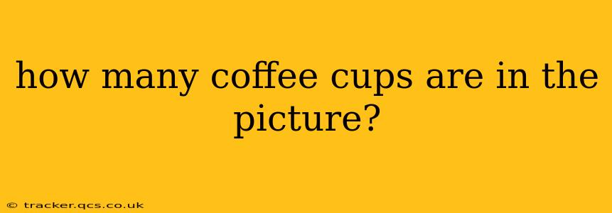 how many coffee cups are in the picture?