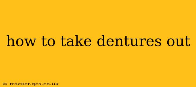 how to take dentures out